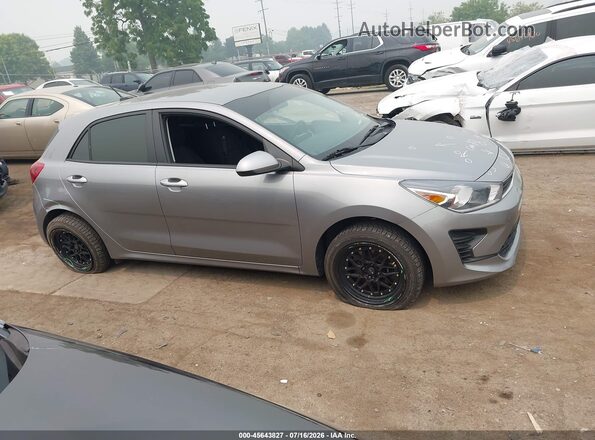 3KPA25ADXPE597432 2023 KIA RIO 5-DOOR Gray Вид задньої частини салону