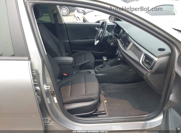 3KPA25ADXPE597432 2023 KIA RIO 5-DOOR Gray Вид салону спереду