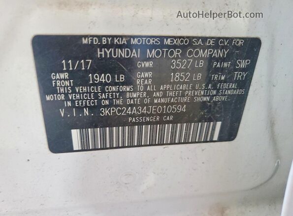 3KPC24A34JE010594 2018 HYUNDAI ACCENT White Engine compartment view