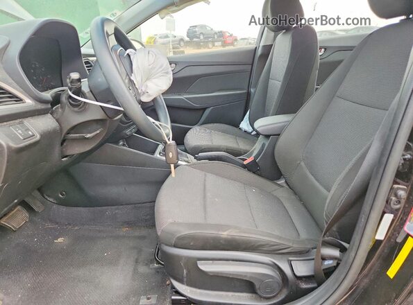 3KPC24A38JE016933 2018 HYUNDAI ACCENT Black Front interior view