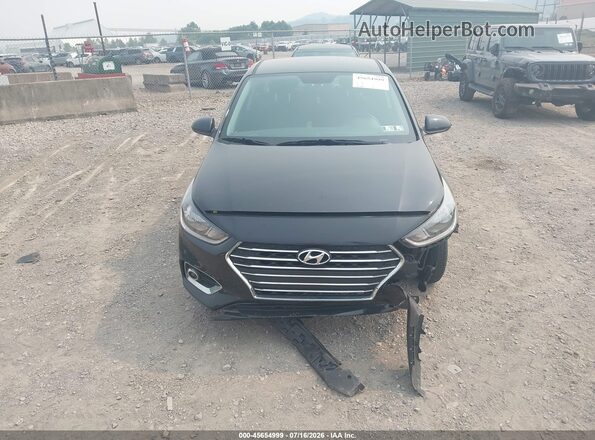 3KPC24A67NE179072 2022 HYUNDAI ACCENT Black Vista interior trasera