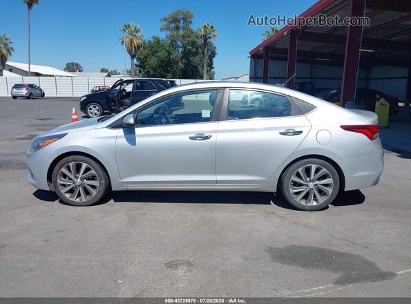 3KPC34A36KE054949 2019 HYUNDAI ACCENT Silver Vista interior trasera