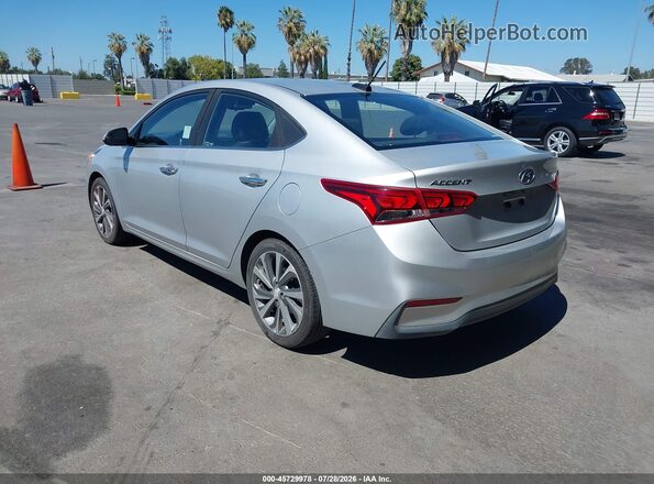 3KPC34A36KE054949 2019 HYUNDAI ACCENT Silver Trasero izquierdo