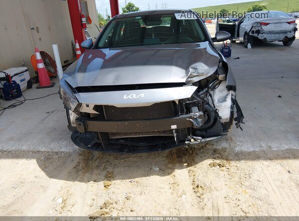 3KPF24AD0PE559935 2023 KIA FORTE Gray Вид спереду