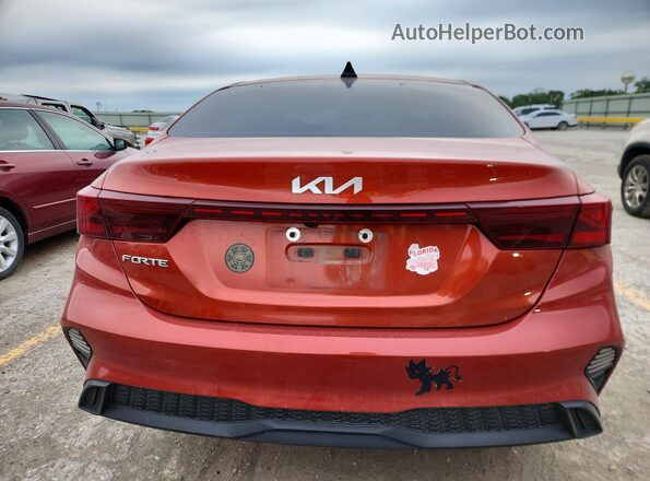 3KPF24AD0PE580977 2023 KIA FORTE Оранжевый Вид сзади