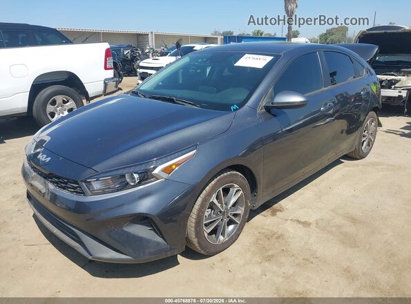 3KPF24AD0PE670551 2023 KIA FORTE Gray Vista tres cuartos delantera izquierda