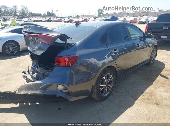 3KPF24AD0PE670551 2023 KIA FORTE Gray Trasero derecho