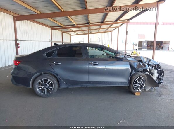 3KPF24AD0RE701557 2024 KIA FORTE Gray Vista interior trasera