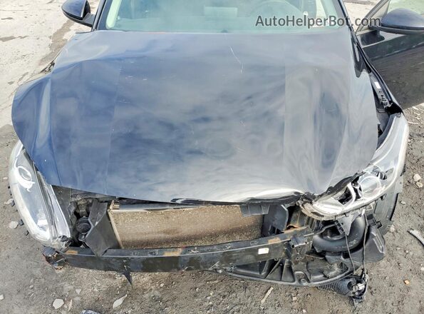 3KPF24AD2KE025201 2019 KIA FORTE Черный Вид задней части салона