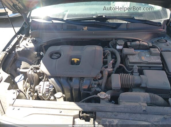 3KPF24AD2RE726959 2024 KIA FORTE Gray Rear view