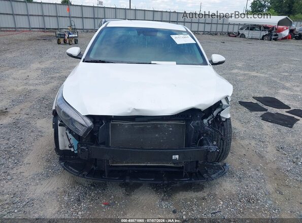 3KPF24AD3RE733130 2024 KIA FORTE White Vista interior trasera