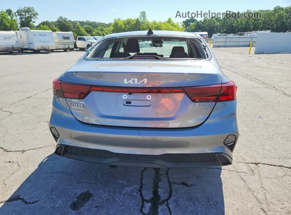 3KPF24AD3RE778147 2024 KIA FORTE Серый Вид сзади