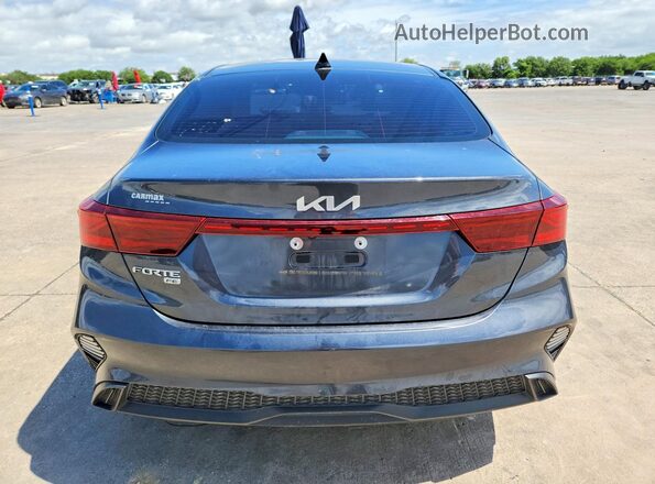 3KPF24AD5PE520614 2023 KIA FORTE Серый Вид сзади
