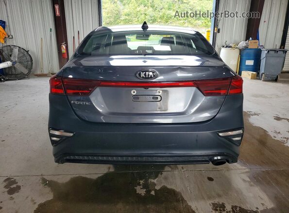 3KPF24AD6KE103253 2019 KIA FORTE Charcoal Rear view