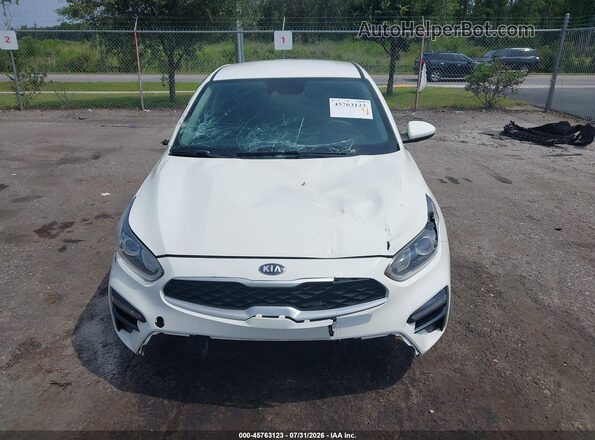 3KPF24AD6KE104841 2019 KIA FORTE White Вид задньої частини салону