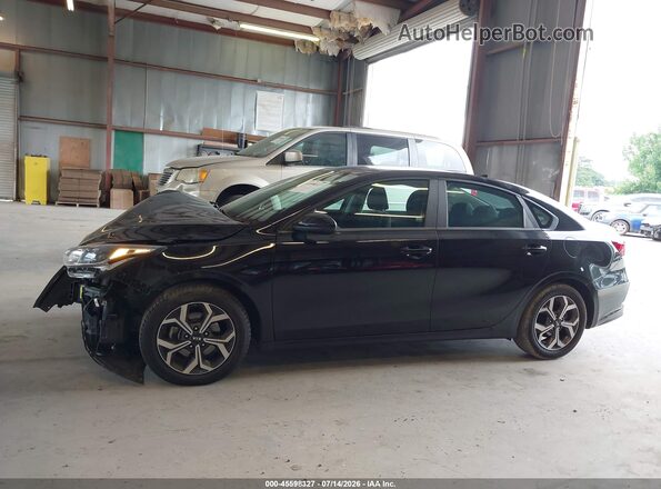 3KPF24AD7ME377161 2021 KIA FORTE Black Rear interior view