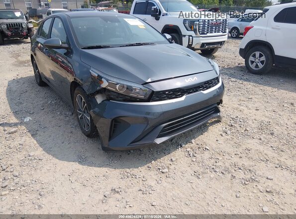 3KPF24AD7PE581365 2023 KIA FORTE Gray Front view