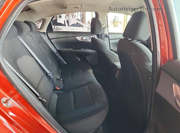 3KPF24AD7RE708263 2024 KIA FORTE Orange Rear seats view