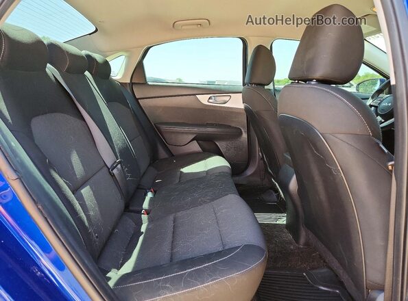 3KPF24AD7RE809853 2024 KIA FORTE Blue Rear seats view