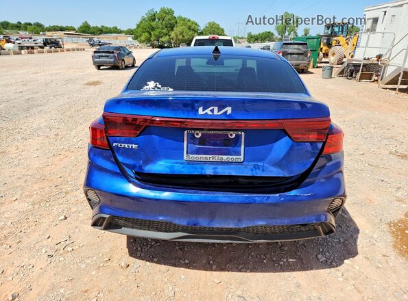 3KPF24AD7RE809853 2024 KIA FORTE Blue Rear view