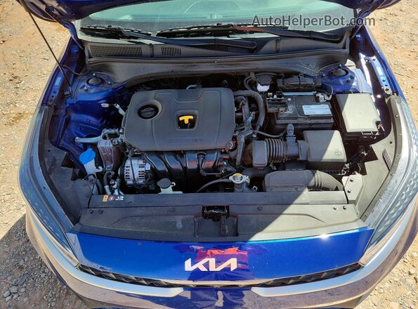 3KPF24AD7RE809853 2024 KIA FORTE Blue Rear interior view