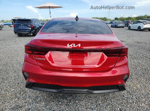 3KPF24AD8PE678977 2023 KIA FORTE Red უკანა ხედი