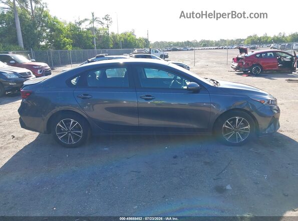 3KPF24AD8RE828525 2024 KIA FORTE Серый Вид задней части салона