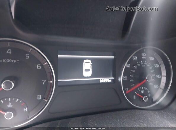 3KPF24AD9RE721886 2024 KIA FORTE White Vista de los asientos traseros