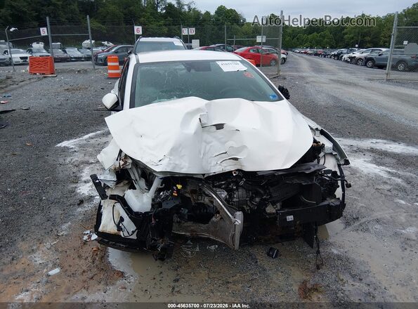 3KPF24AD9RE768738 2024 KIA FORTE White Вид задньої частини салону
