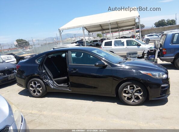 3KPF24ADXKE016648 2019 KIA FORTE Black Rear interior view