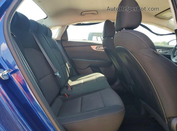 3KPF24ADXPE513951 2023 KIA FORTE Blue Rear seats view
