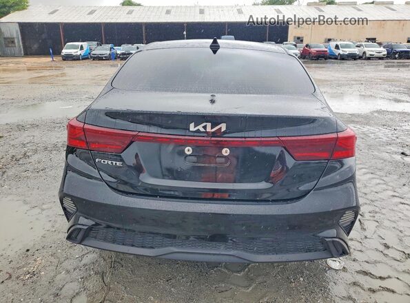 3KPF24ADXPE647469 2023 KIA FORTE Black Rear view