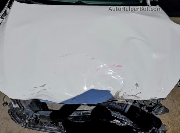 3KPF24ADXRE699073 2024 KIA FORTE White Вид задньої частини салону
