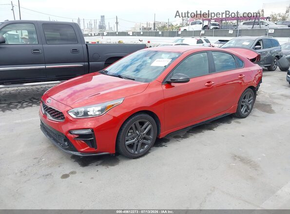 3KPF34AD8ME409029 2021 KIA FORTE Orange Vista tres cuartos delantera izquierda
