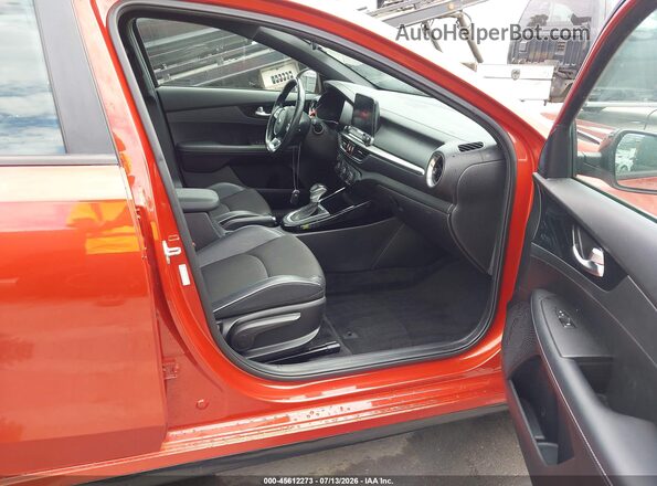 3KPF34AD8ME409029 2021 KIA FORTE Orange Vista interior delantera
