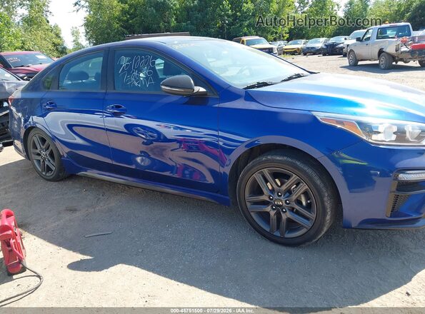 3KPF34AD9ME283005 2021 KIA FORTE Blue Vista interior trasera