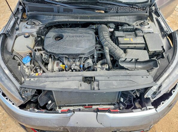 3KPF44AC8RE740852 2024 KIA FORTE Серый Вид задней части салона
