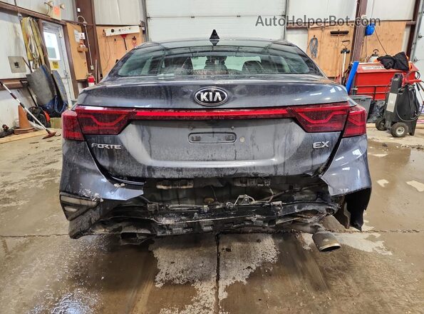 3KPF54AD1KE097868 2019 KIA FORTE Gray უკანა ხედი