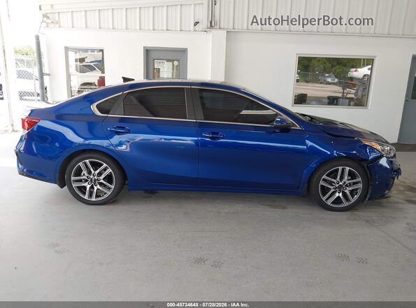 3KPF54AD1ME403518 2021 KIA FORTE Blue Rear interior view