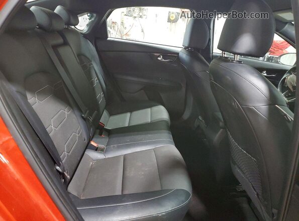 3KPF54AD2PE607703 2023 KIA FORTE Orange Rear seats view