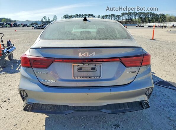 3KPF54AD4PE542899 2023 KIA FORTE Silver უკანა ხედი