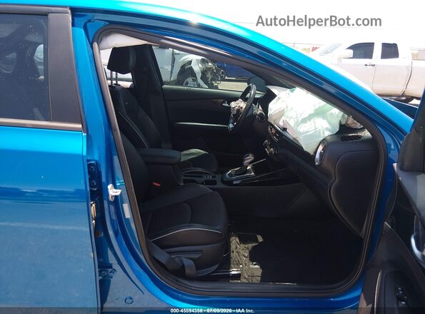 3KPF54AD4PE573943 2023 KIA FORTE Blue წინა სალონის ხედი