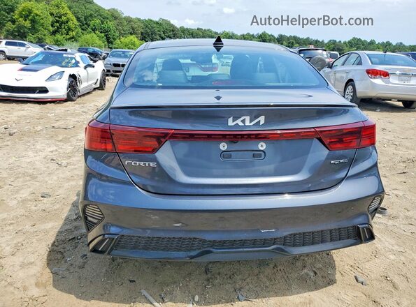 3KPF54AD4PE611106 2023 KIA FORTE Серый Вид сзади