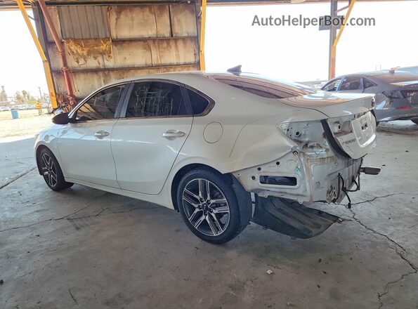 3KPF54AD5KE056675 2019 KIA FORTE White Trasero izquierdo