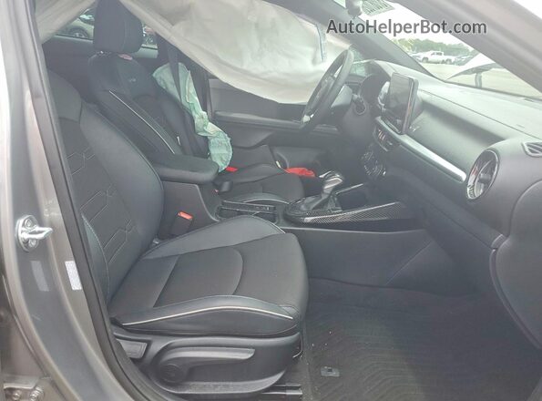 3KPF54AD6RE771085 2024 KIA FORTE Серый Вид салона спереди