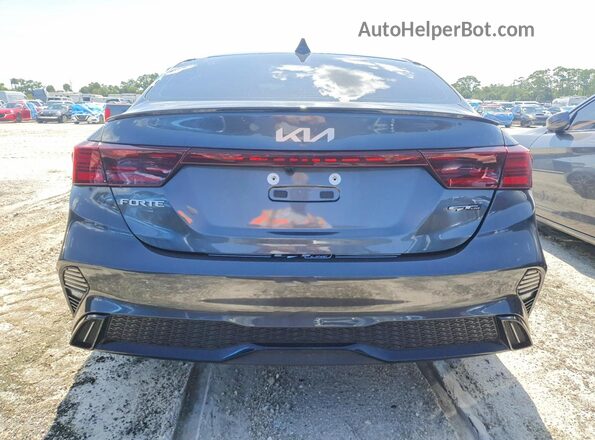 3KPF54AD6RE772463 2024 KIA FORTE Gray უკანა ხედი