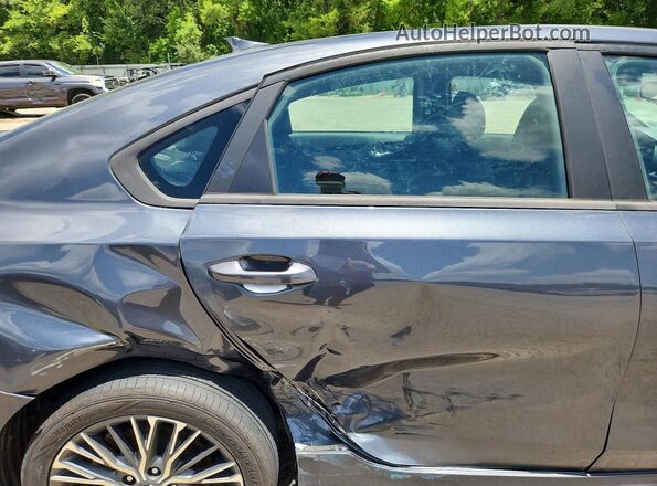 3KPF54AD7NE449758 2022 KIA FORTE Charcoal Widok tylnych siedzeń