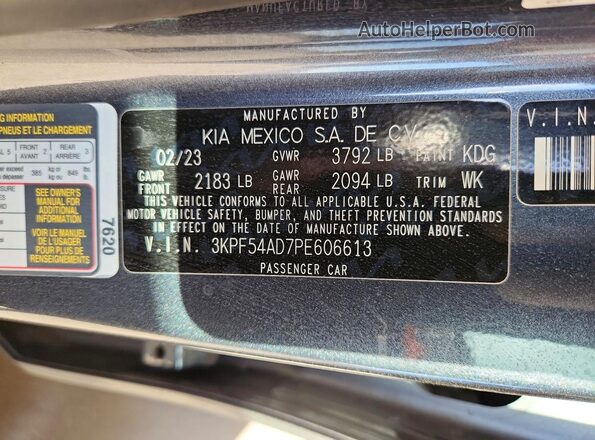 3KPF54AD7PE606613 2023 KIA FORTE Gray Widok komory silnika