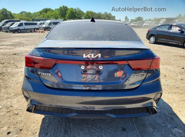 3KPF54AD8PE559060 2023 KIA FORTE Gray Widok z tyłu