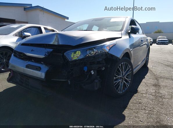 3KPF54AD9PE659460 2023 KIA FORTE Silver Вид спереду
